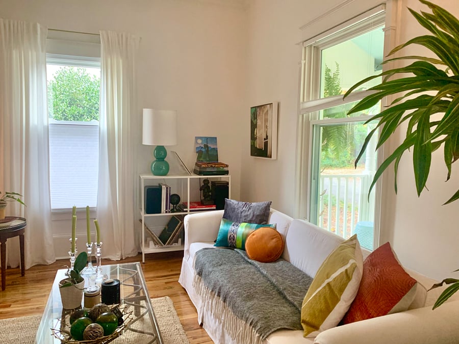 Downstairs shared living space, which I call the "parlor," with lots of local art and a smart TV.