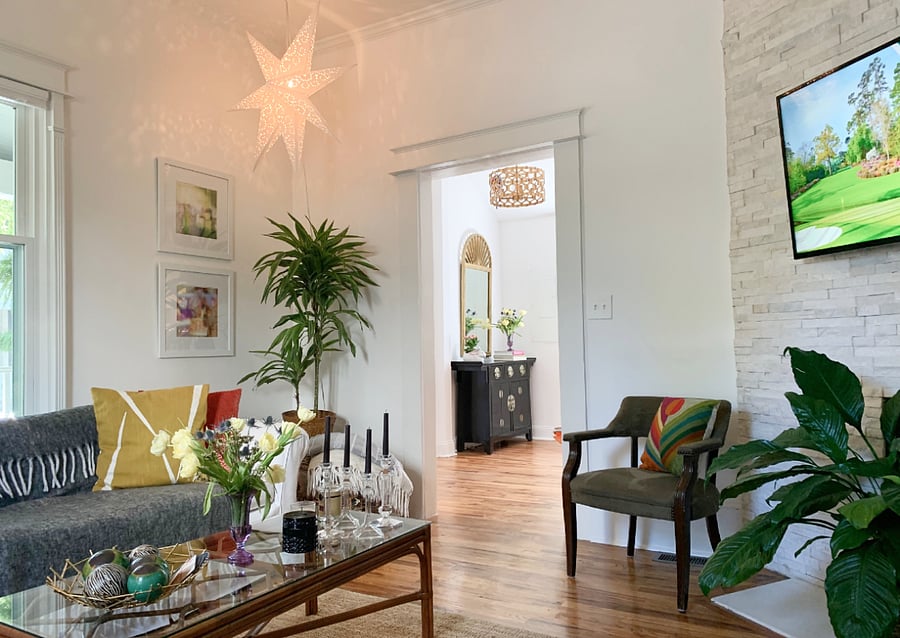 Downstairs shared living space, which I call the "parlor," with lots of local art and a smart TV.
