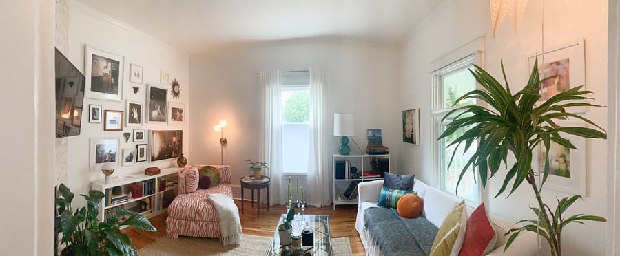 Downstairs shared living space, which I call the "parlor," with lots of local art and a smart TV.