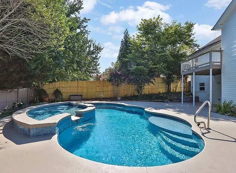 Outdoor pool with private entrance into the basement apartment