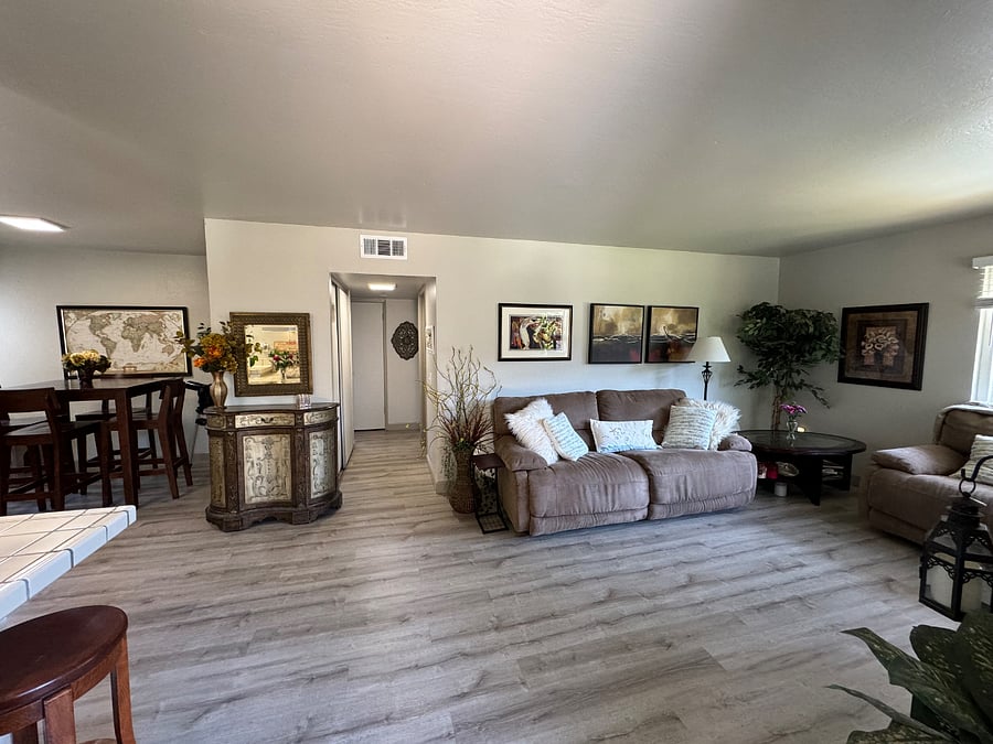 Elegant living room space. TV and Internet. Large windows.