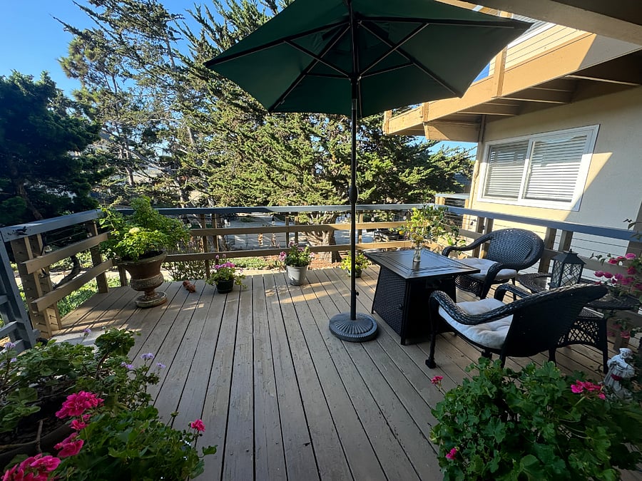 Large private patio with gate. Nicely furnished. Beautiful flowers, roses, and lemon tree. Private beach entrance steps away. Pool.