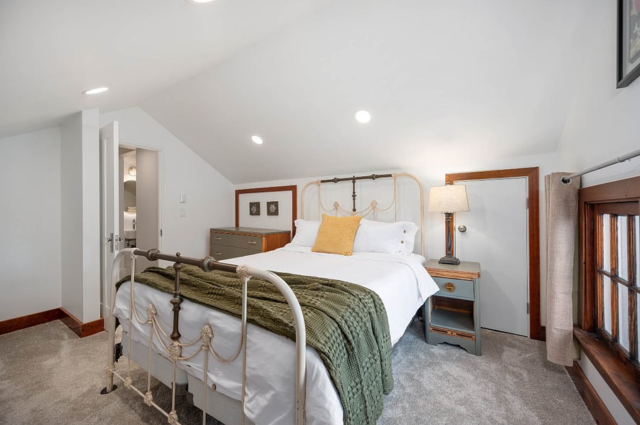 Upstairs bedroom with queen size bed. Blackout curtains.