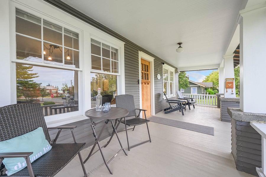 Gorgeous covered front porch. Perfect place to relax and enjoy your favorite beverage.