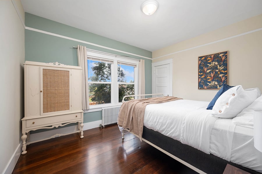 1st bedroom with queen sized bed. Blackout curtains.