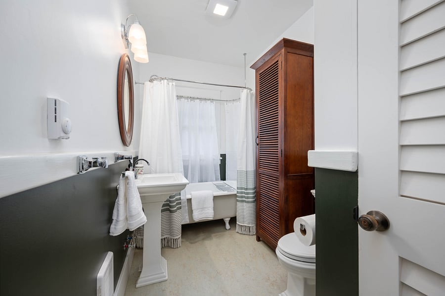 Full bathroom on main floor. Large linen cabinet.