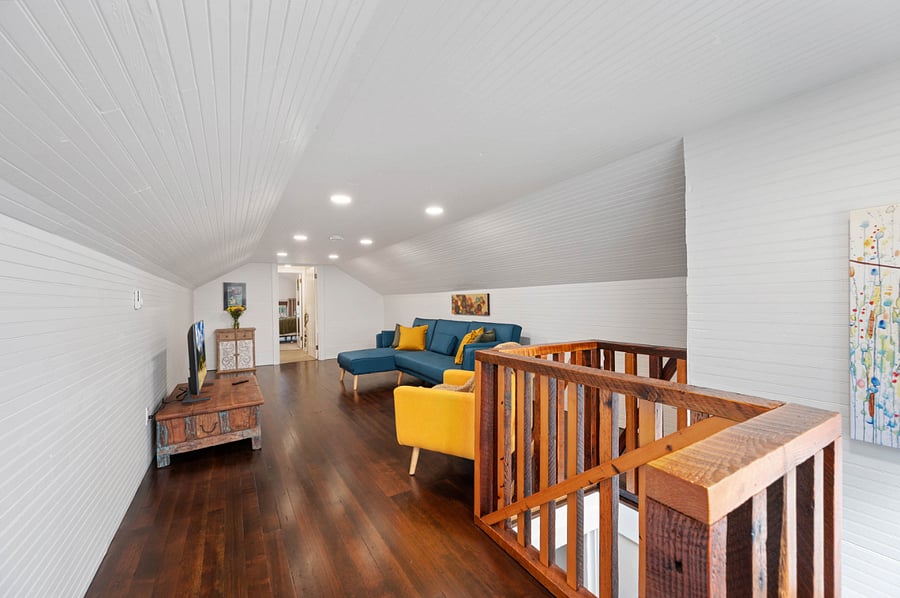 Upstairs living area. Beautiful fir floors.