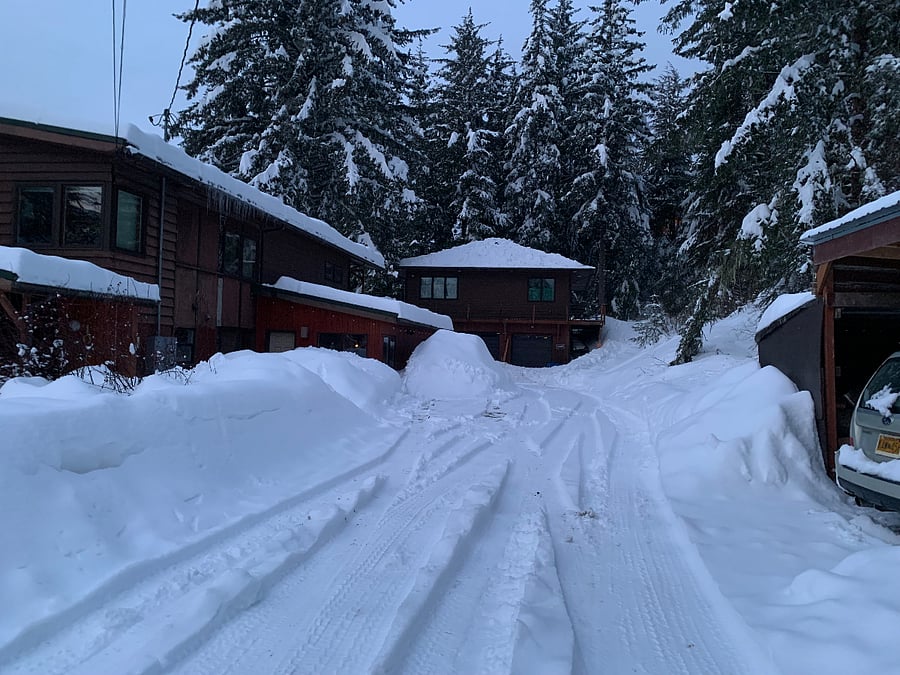 A photo of heavy snow in the driveway. We don't always get heavy snow but it can happen once or twice in a winter. I have a person come and plow my driveway.