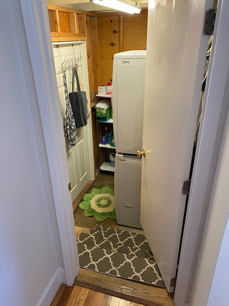 Two steps down into private area in garage with your own washer/dryer and storage area