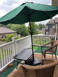 Balcony overlooking the quiet backyard.