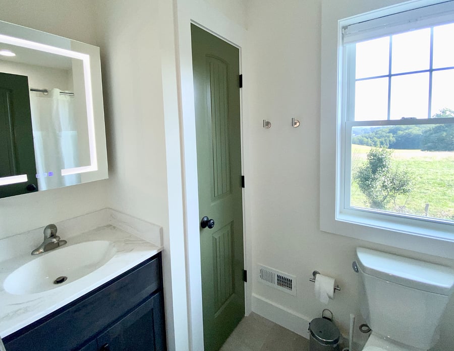 Upstairs bathroom with closet and tub/shower