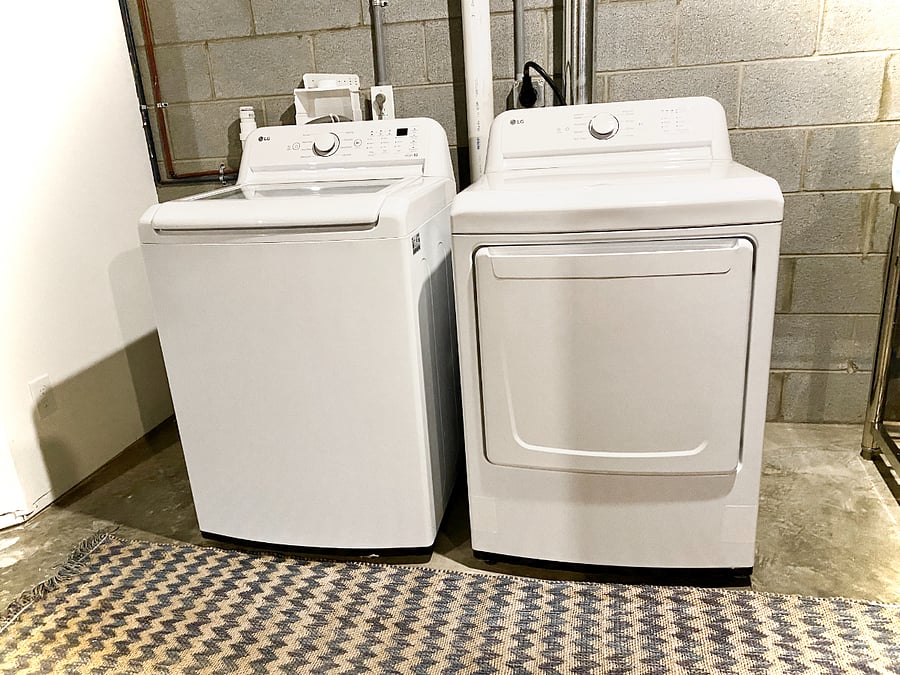 Full size washer and dryer in basement