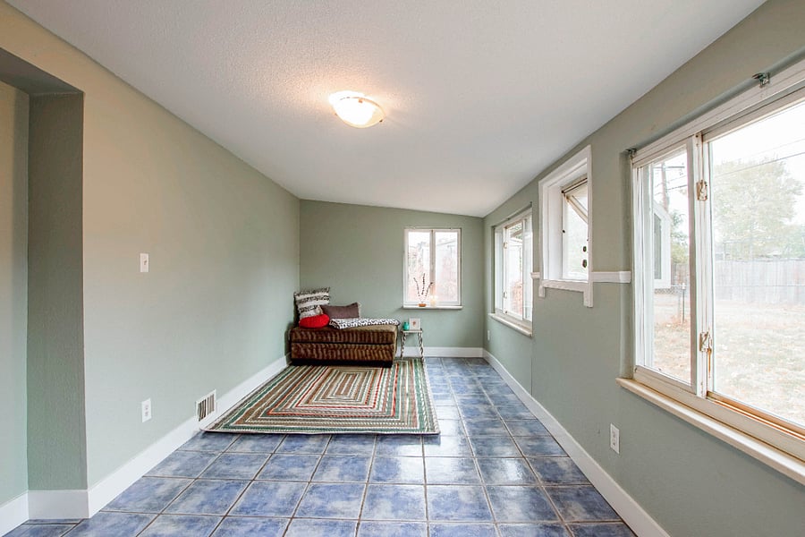 Relax in the sunroom.