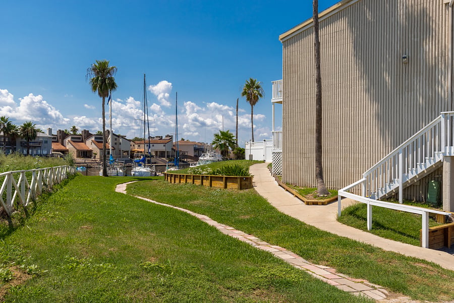 The walk way that leads to the exterior pool, boat docks, canal and fish cleaning station