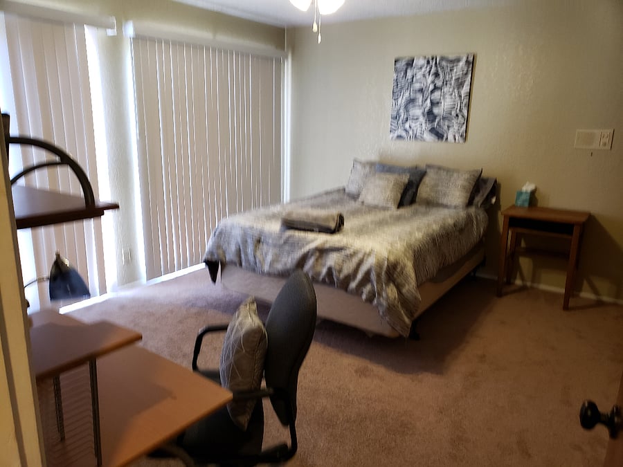 View of the balcony bedroom from the hallway.