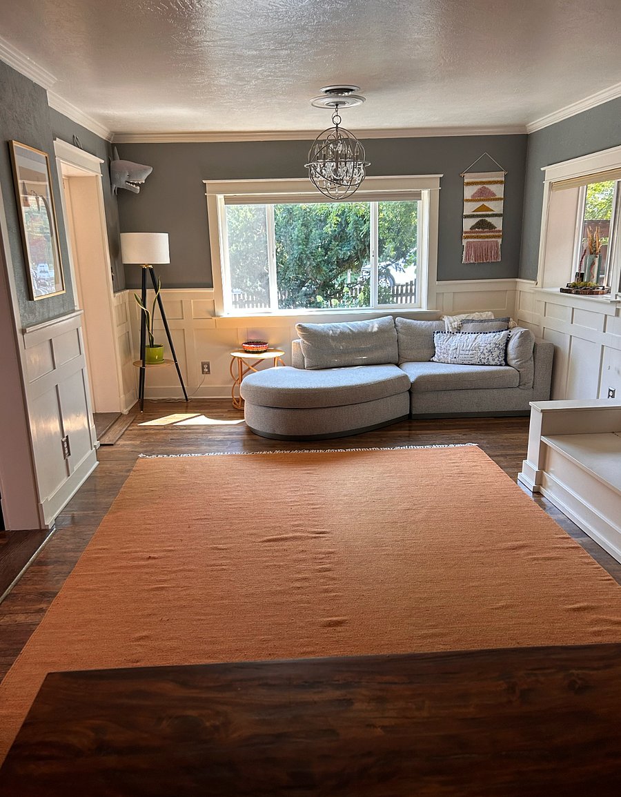 From the sun room, you step into the open living room.