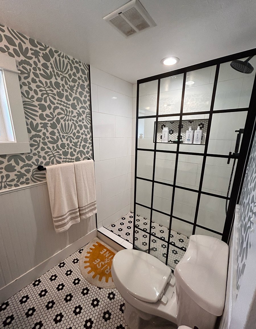 The bathroom was recently remodeled with a walk in shower.