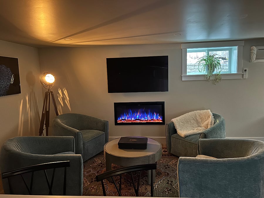 Cozy living room with smart tv and electric fireplace