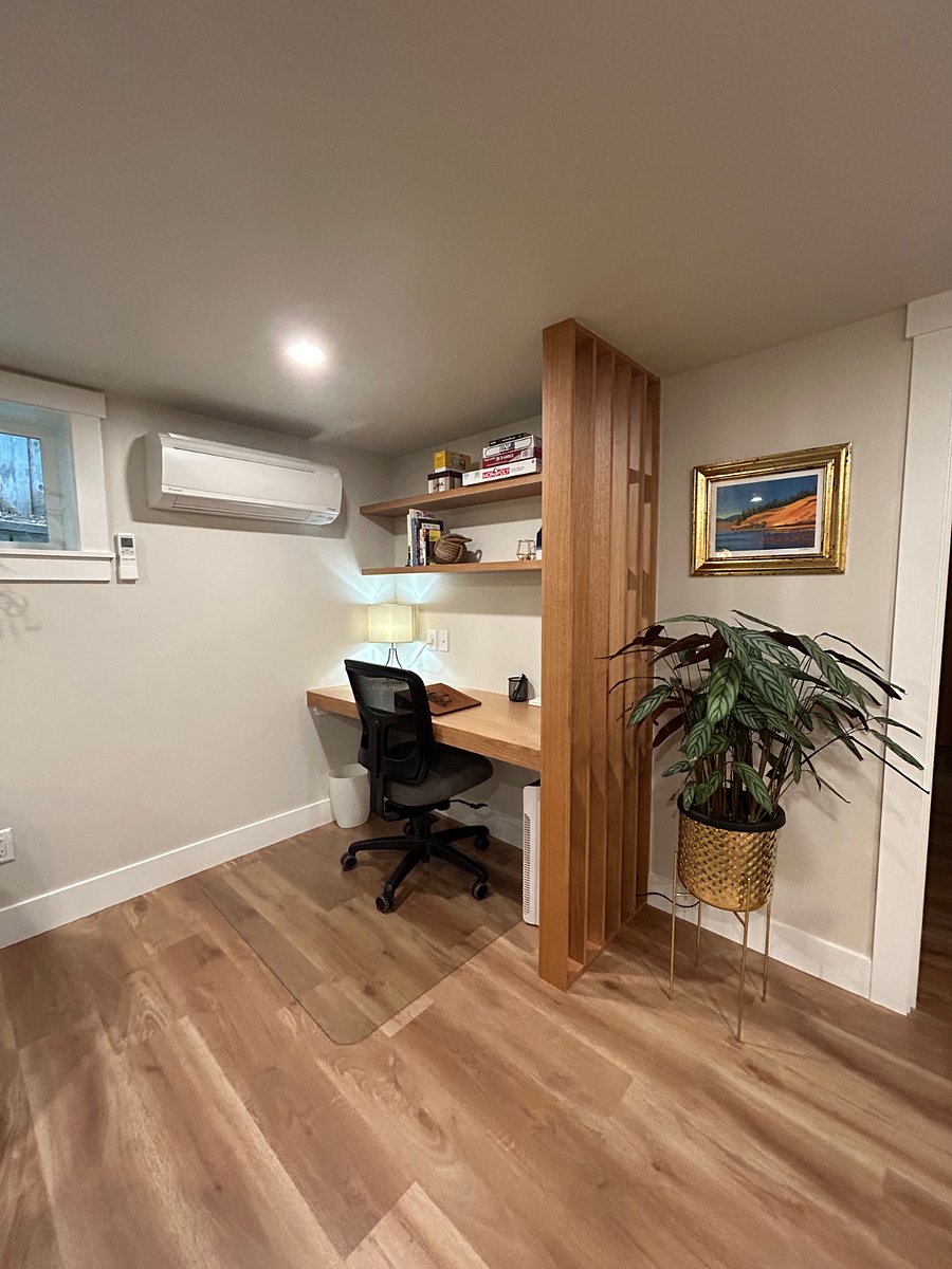 Custom white oak desk with adjustable office chair and wifi