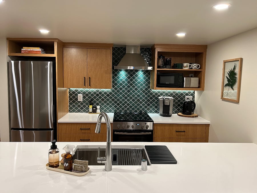 Gorgeous kitchen equipped with new appliances (including a dishwasher!) and all the basics you need to prepare meals