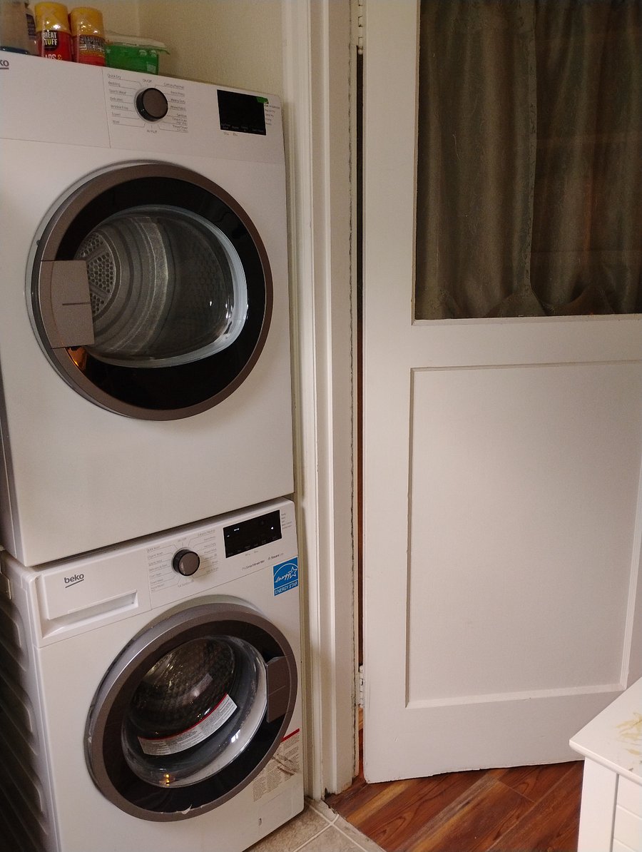 Eco friendly small washer and dryer. The laundry has a door to the backyard, and my work studio. The door to the house will have a lock and curtain on your side for complete privacy. Only usage we have as a "shared" space is for mail. If a mail order (cardboard box or package) is delivered to the front porch I will put it in the laundry room for safe keeping.