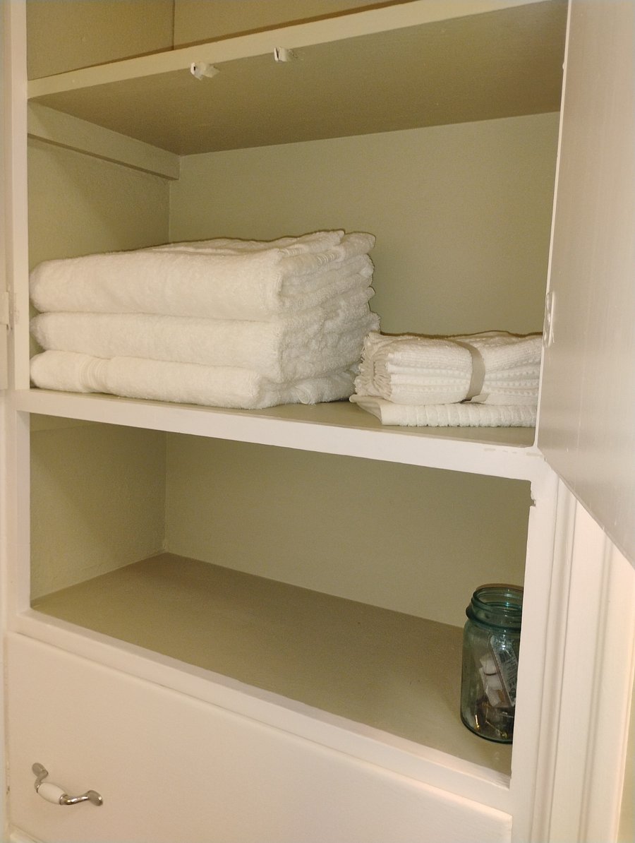 Bathroom has a little nook area for lotions, epson salts etc. I'd love to add your favorite soaking salts for your move in date. You may want to take a nice hot soothing bath. Moving is a lot of work!