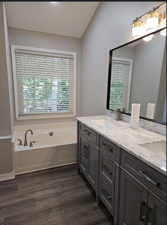 Master bathroom with shower and jacuzzi