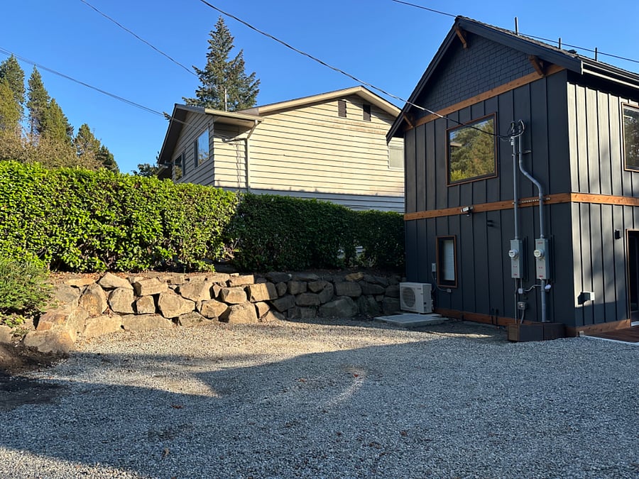 Two parking spots adjacent to house