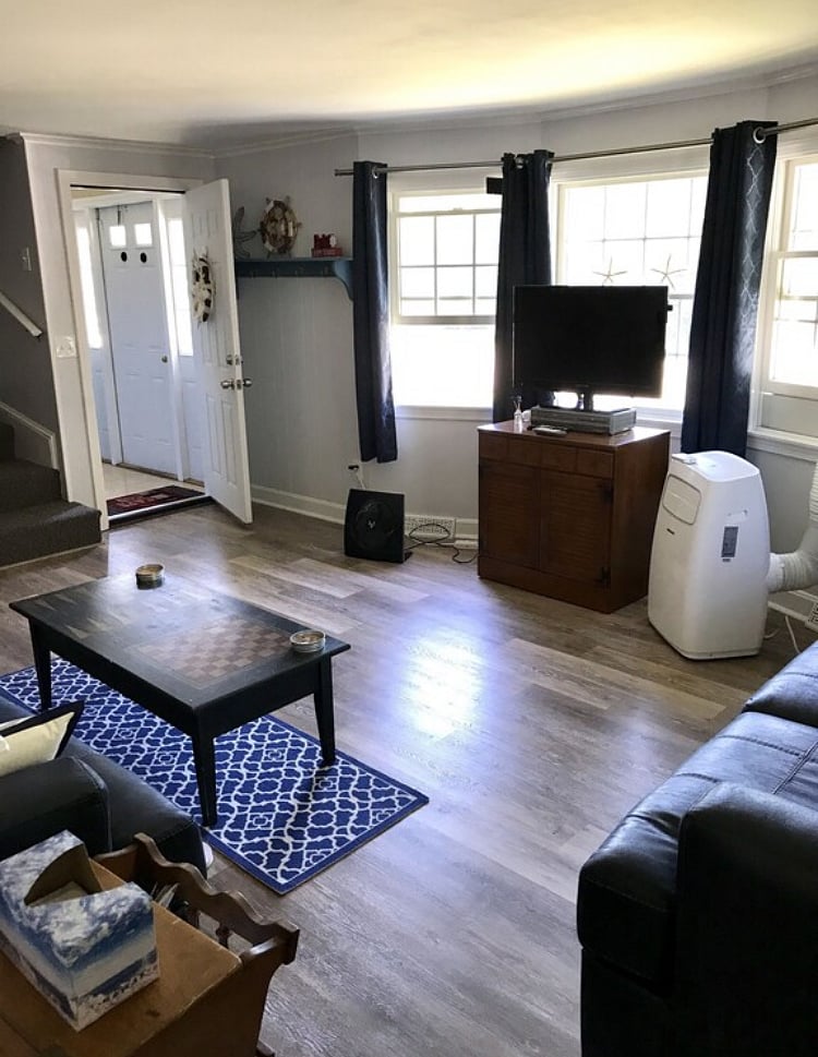 Living room with full pull out sleeper couch and loveseat.