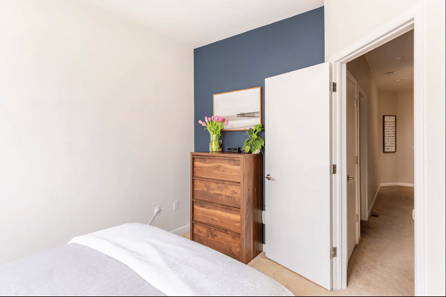 This 4 drawer dresser and small walk-in closet allow for plenty of storage space.