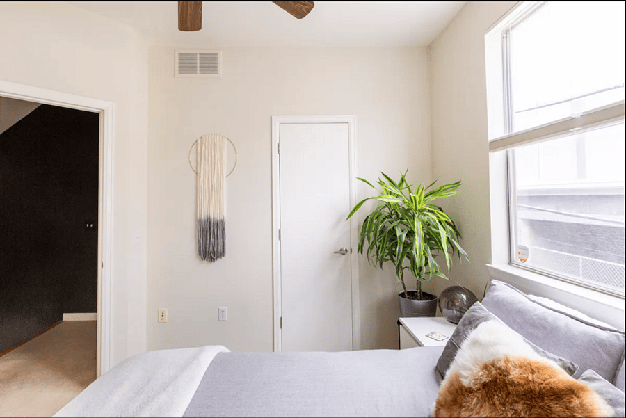 This door leads to your small walk-in closet.