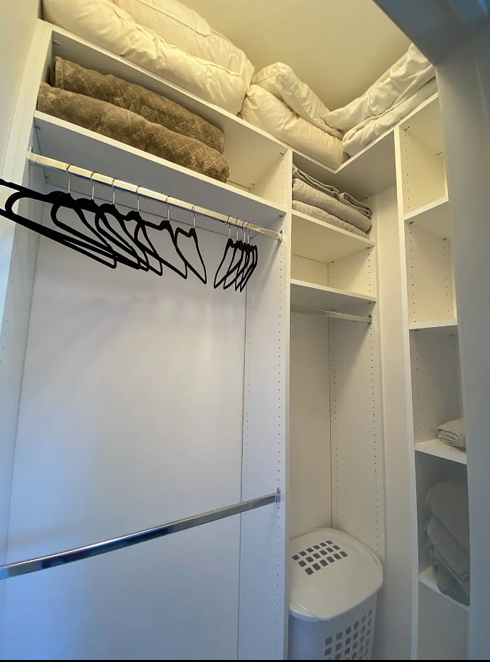 Your private, small walk-in closet includes hangers, extra linens + blankets, towels, and a hamper.