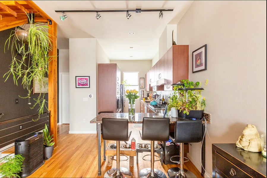 Dine at the bar and enjoy the natural light throughout the townhome.