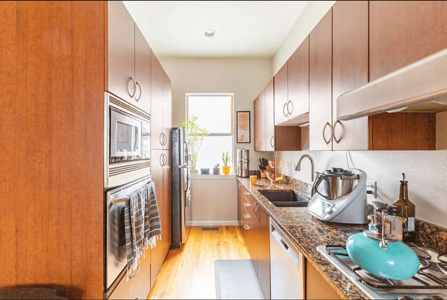 The shared kitchen -- fridge, oven, microwave, stove, dishwasher and plenty of storage.