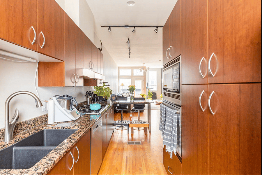 The shared kitchen -- fridge, oven, microwave, stove, dishwasher and plenty of storage.