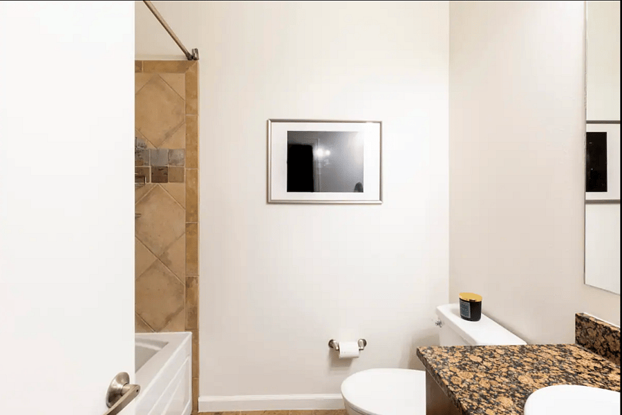 The shared full bathroom.
