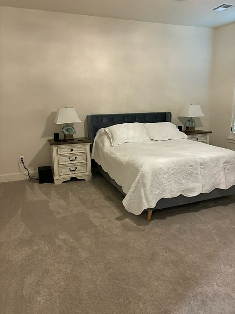 Master suite queen bed with phone charger outlets