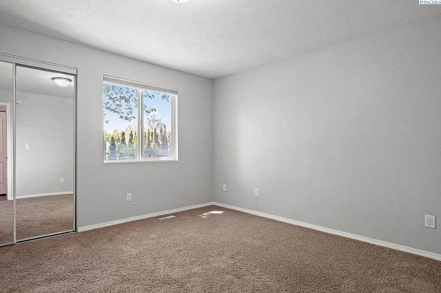 Large Guest Bedroom which shares bathroom