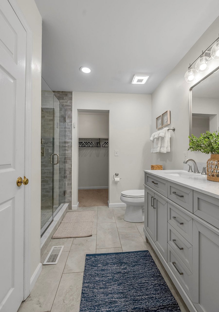 Main level King Suite bathroom looking into large walk-in closet