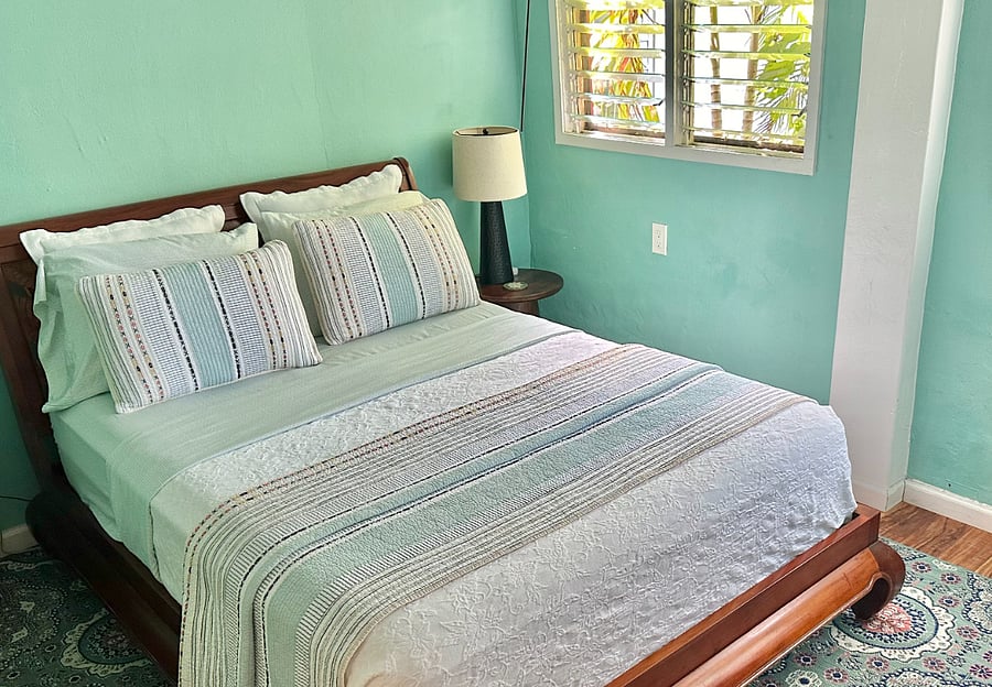 Queen bed and two end tables.