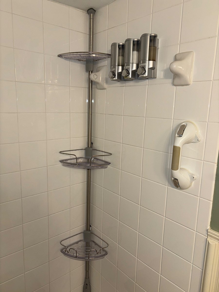 Shower Gel, Conditioner and Shampoo are provided. I choose non toxic and or organic products. Grab bar to assist upon entering the shower. NO TUB, this is a walk in. Corner shower caddy for your personal belongings. 