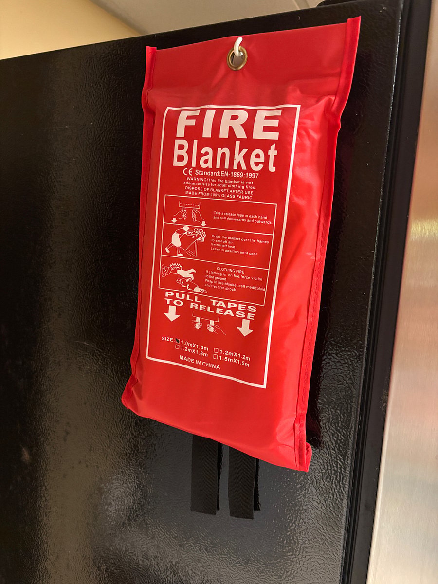 Safety is important! This Fire Blanket is in the kitchen hanging on the side of the refrigerator. Easy to use.