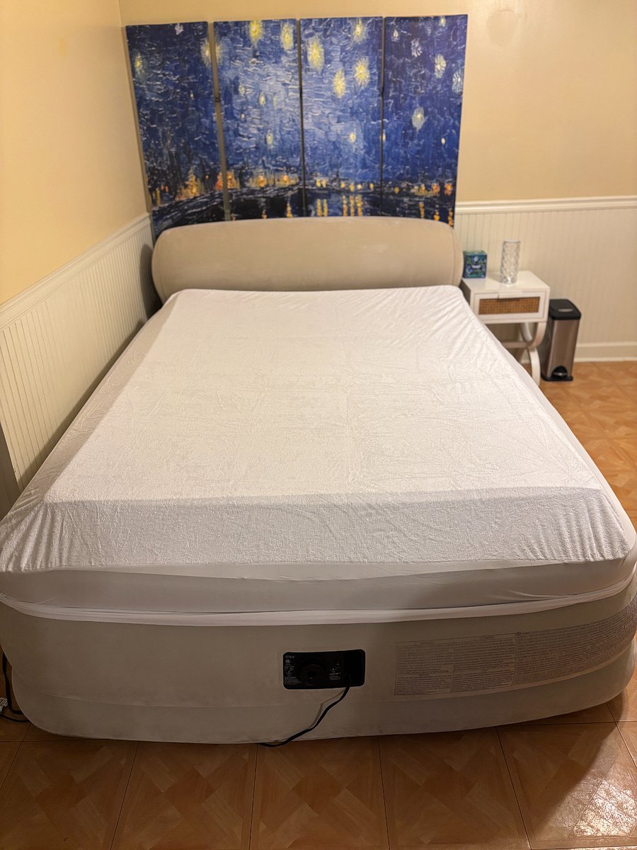 What you see is a premium terry cloth (hypoallergenic) mattress protector covering the 3 inch mattress topper. The Mattress protector helps to protect against dust mites, allergens and has a water resistant barrier.  