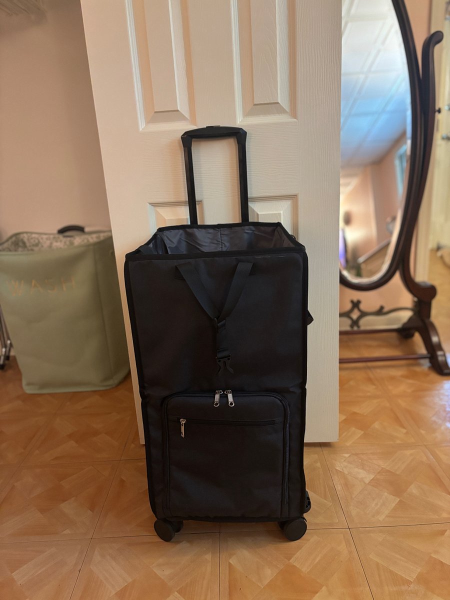 Rolling water resistant laundry basket with pocket for your detergent. 