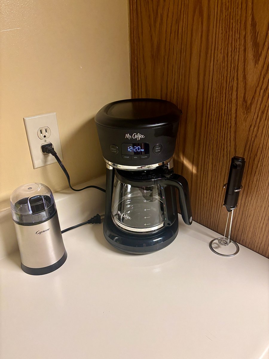 Coffee machine, coffee bean grinder and hand held frother wand.