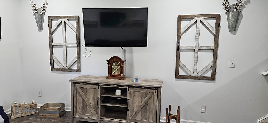 Family Room Smart TV with Roku Stick and Entertainment Center