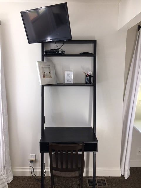 Desk with TV above

