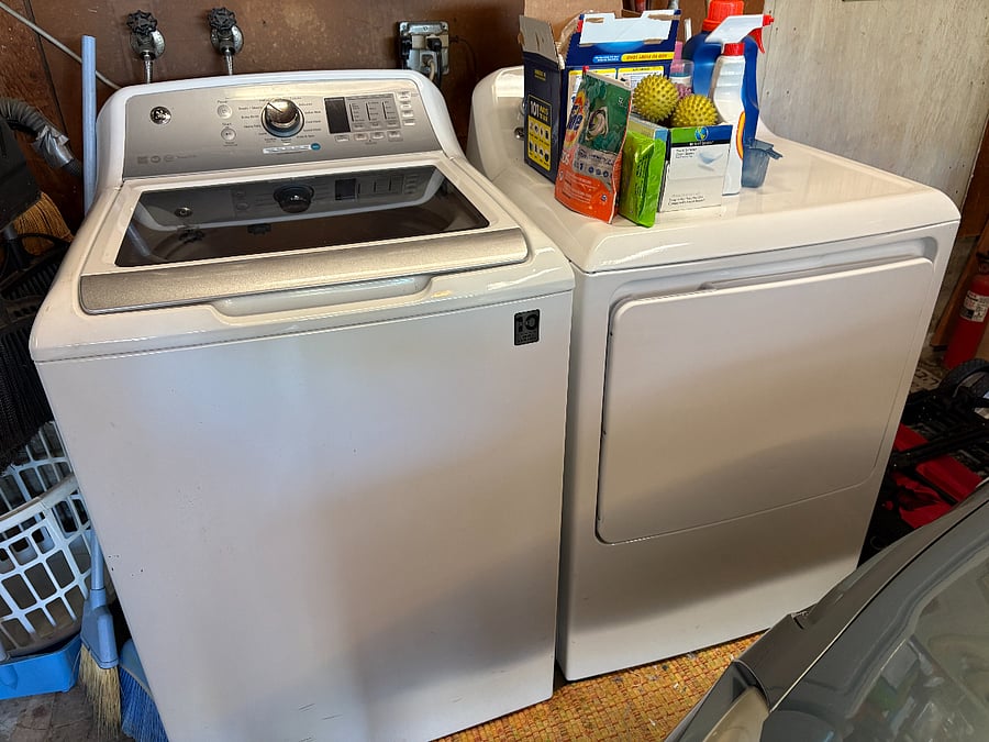 washer and dryer available in the garage, along with full size fridge