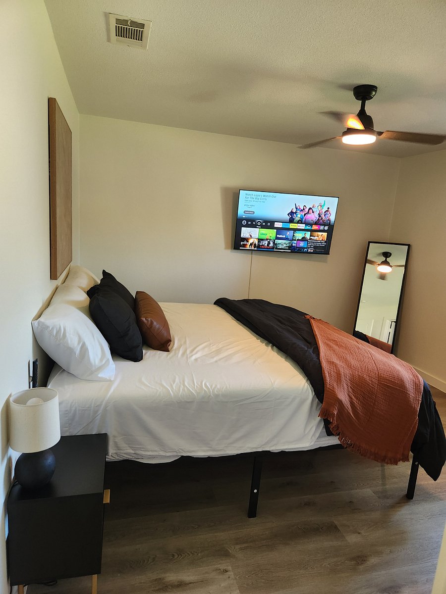 Main bedroom. King mattress with 50" TV