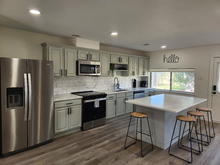 Full size fridge, and fully equipped kitchen